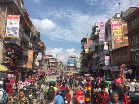 Crowded market on the way to Patan